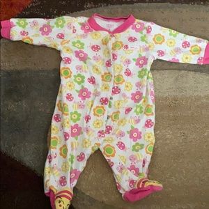 Baby girl feet pajamas. With bees and flowers